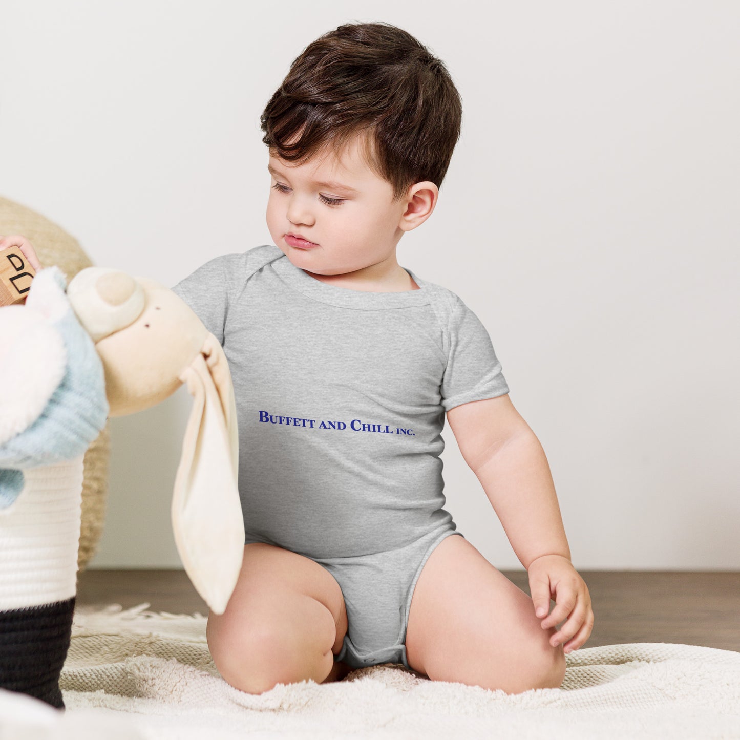 Baby bodysuit with the words Buffett and Chill Inc