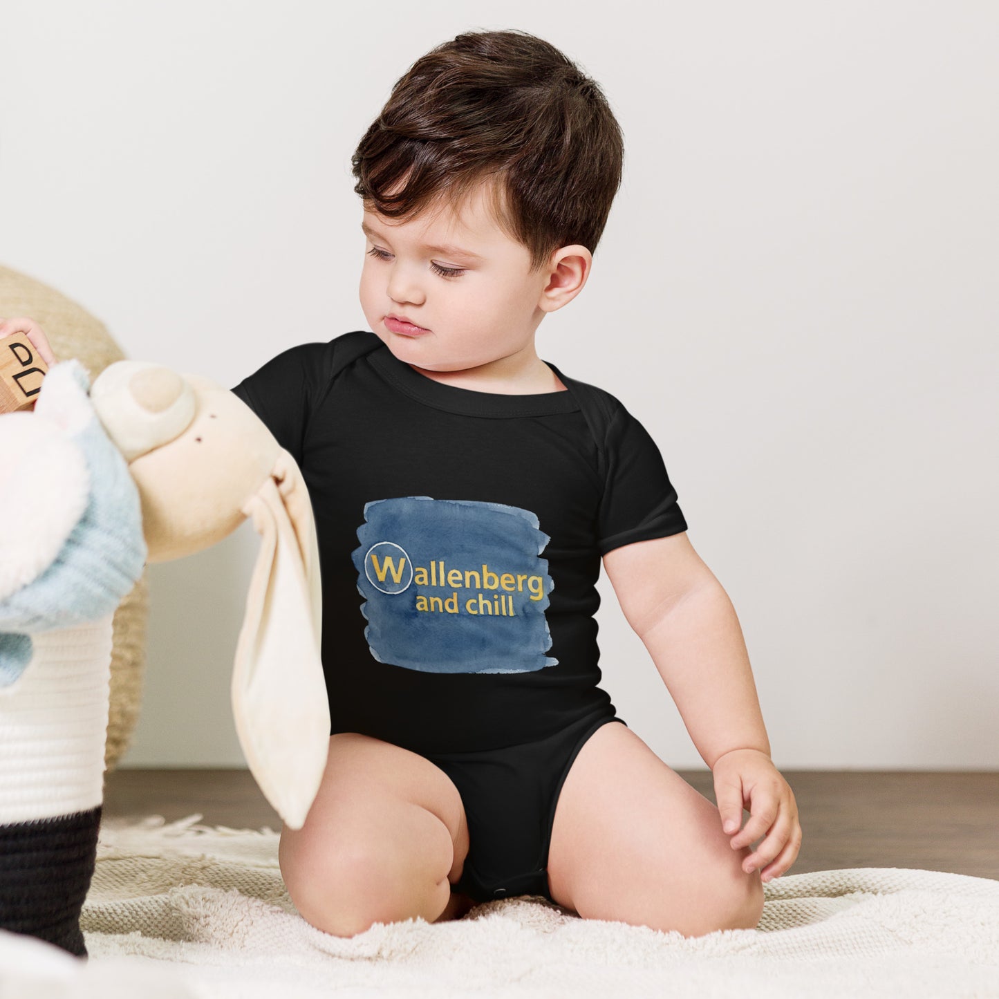 Baby bodysuit with the words Wallenberg and Chill in bold lettering