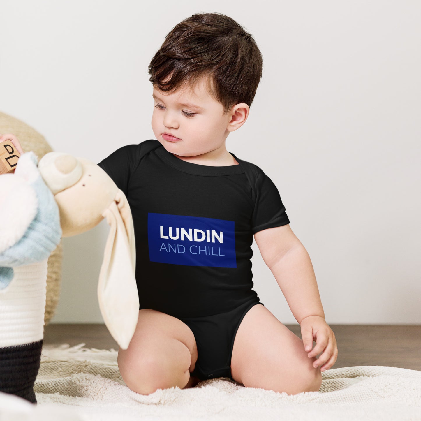 Baby bodysuit with the words Lundin and Chill in bold lettering