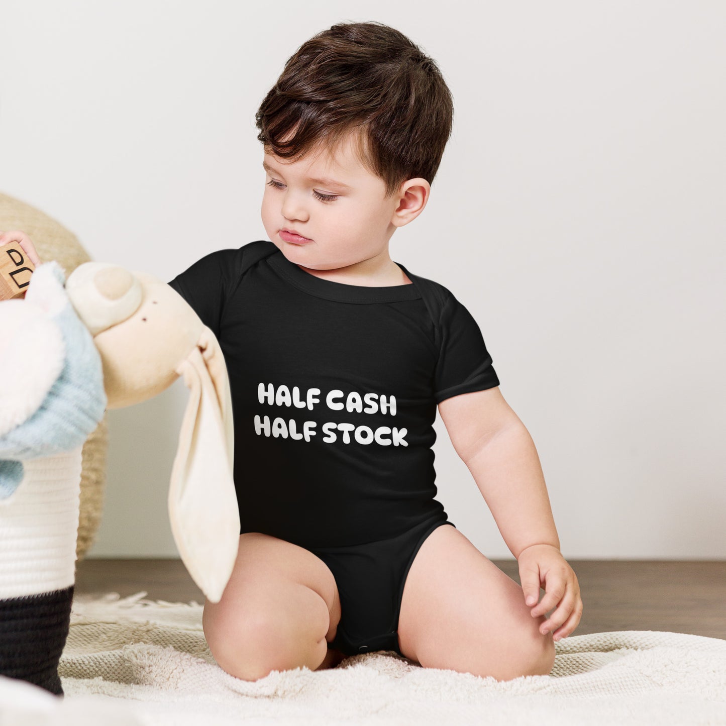 Baby bodysuit with the words Half Cash Half Stock