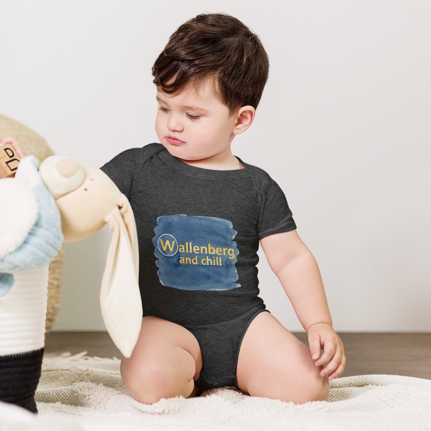 Baby bodysuit with the words Wallenberg and Chill in bold lettering