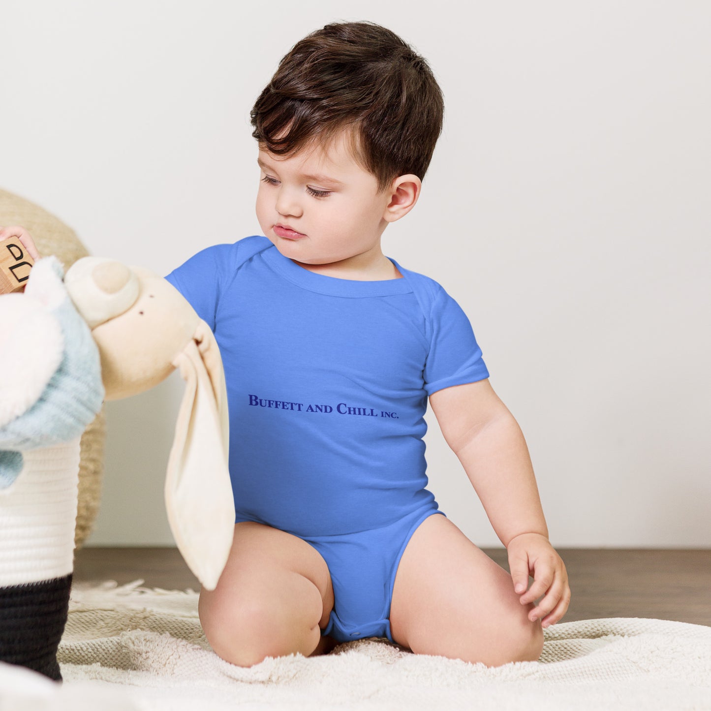 Baby bodysuit with the words Buffett and Chill Inc