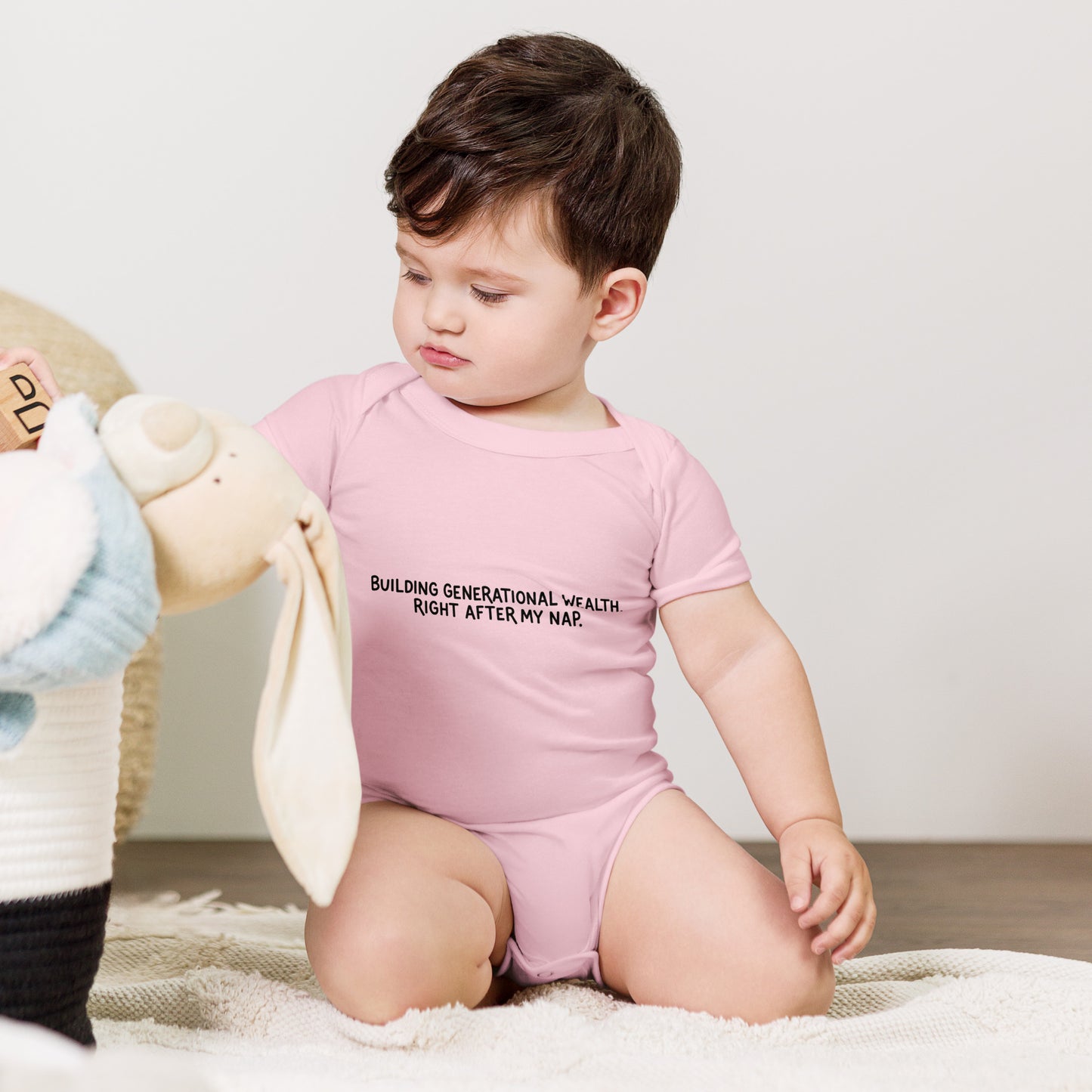 Baby bodysuit with the words Building generational wealth after nap