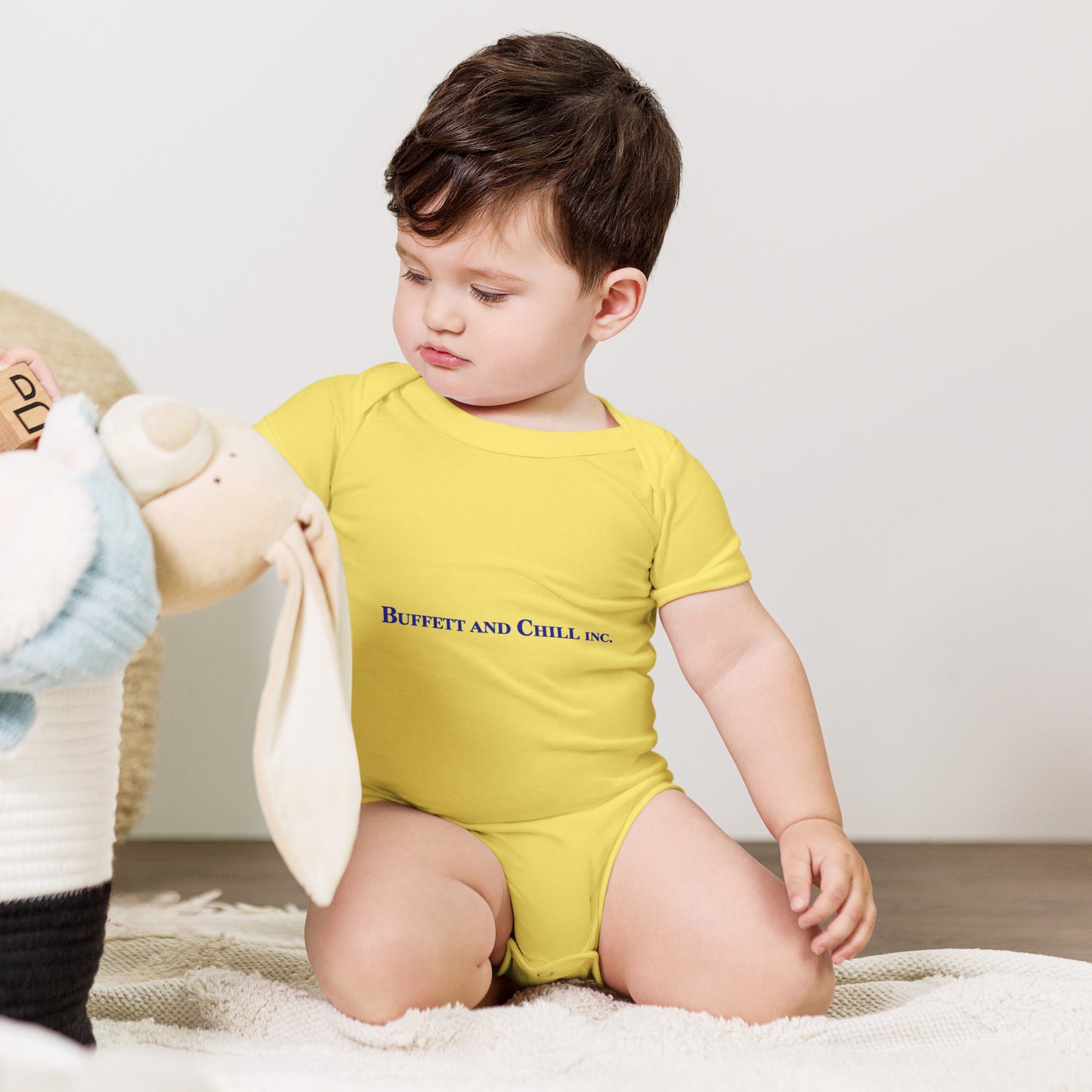 Baby bodysuit with the words Buffett and Chill Inc