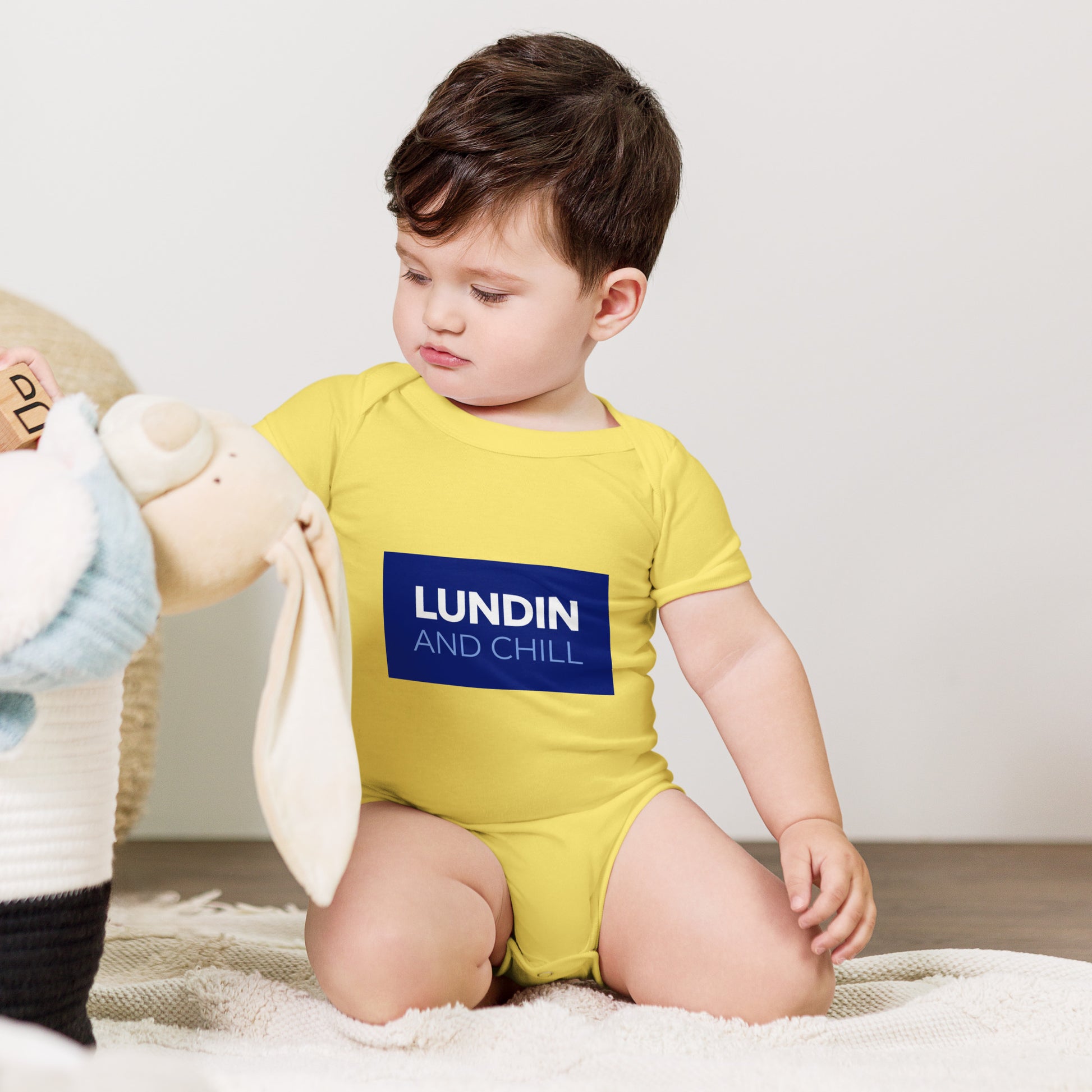 Baby bodysuit with the words Lundin and Chill in bold lettering