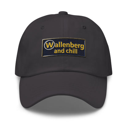 Embroidered navy and gold enamel-pin-style "Wallenberg and Chill" design on a dad hat