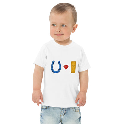 Toddler t-shirt with a horseshoe design and the words Blue Horseshoe Loves Gold