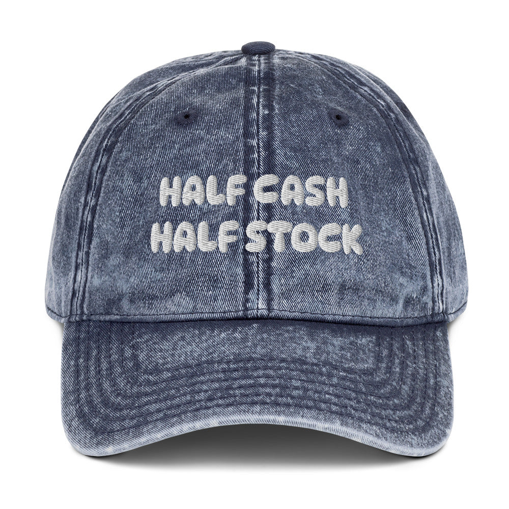 Embroidered "Half cash, half stock" text on a vintage washed cotton twill cap