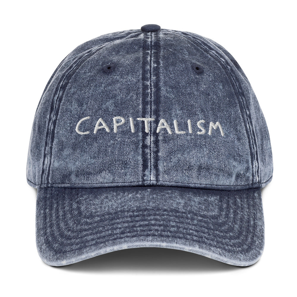 "Capitalism" embroidered on a vintage washed cotton twill cap