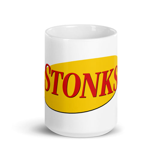 "STONKS" in yellow oval retro sitcom-style lettering on a ceramic mug