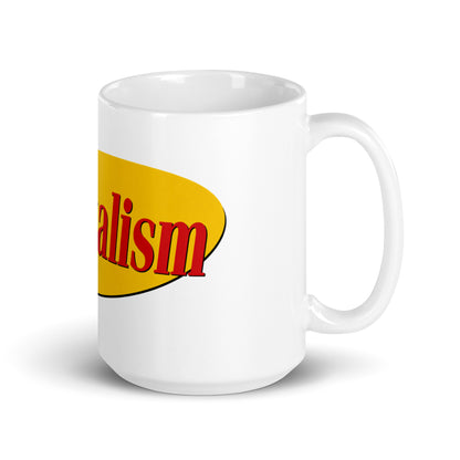 "Capitalism" in yellow oval retro sitcom-style lettering on a ceramic mug