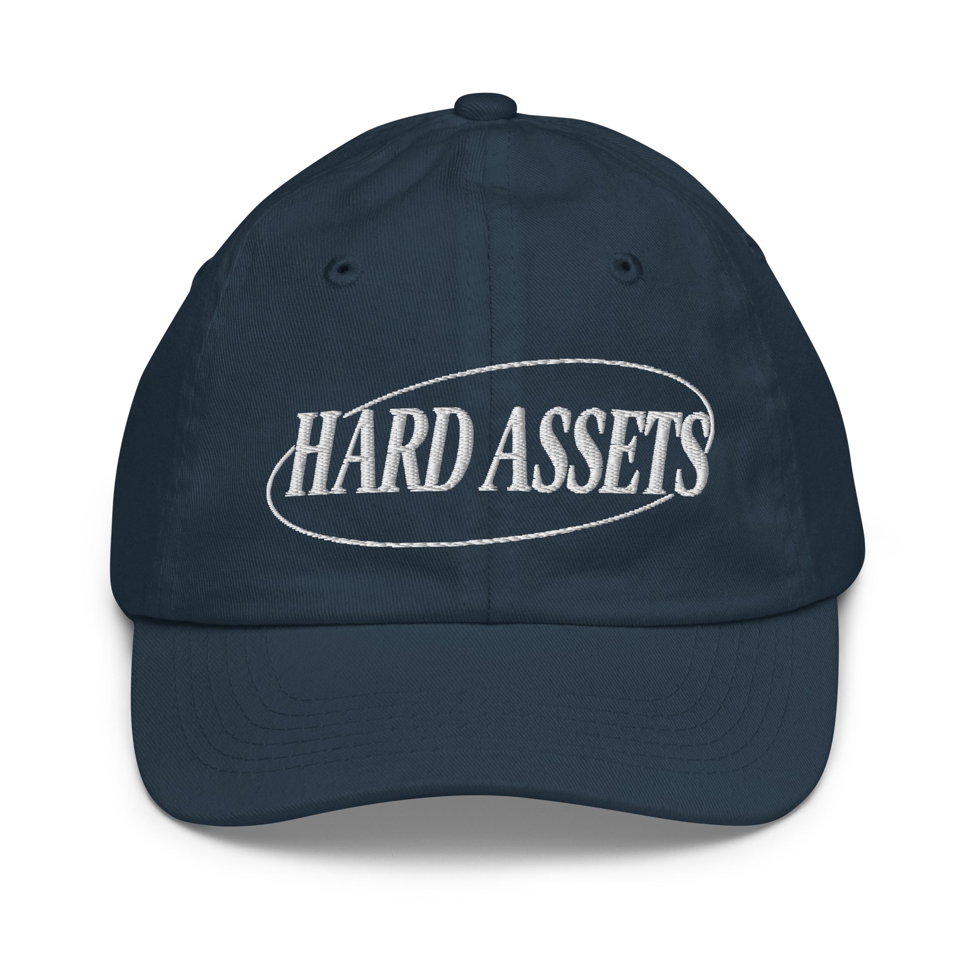 Youth baseball cap with the words Hard Assets in a serif typeface inside an oval badge outline